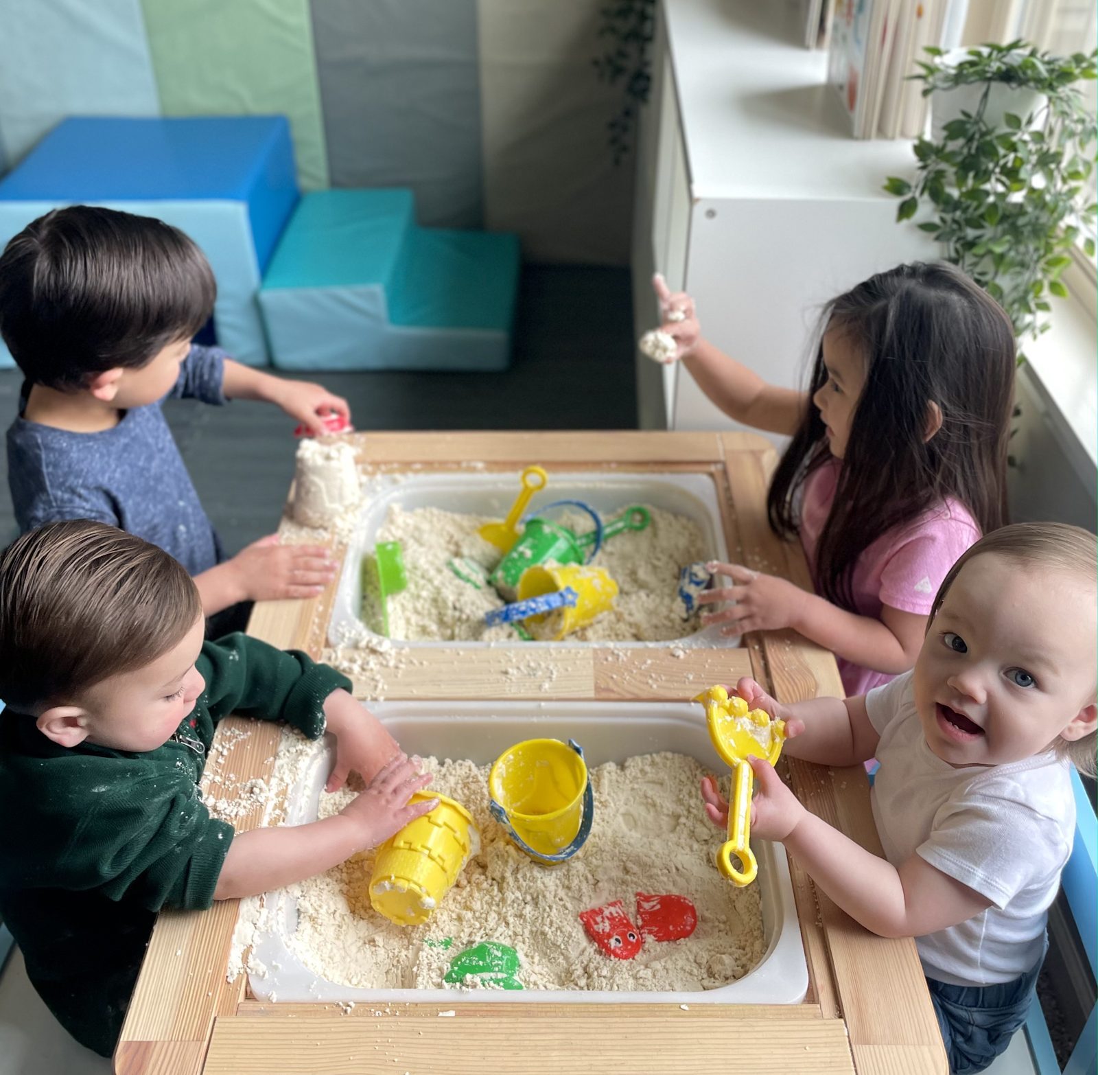 Sand play with buckets and molds